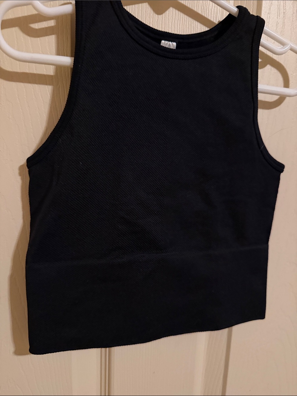 Girl’s cropped tank top.